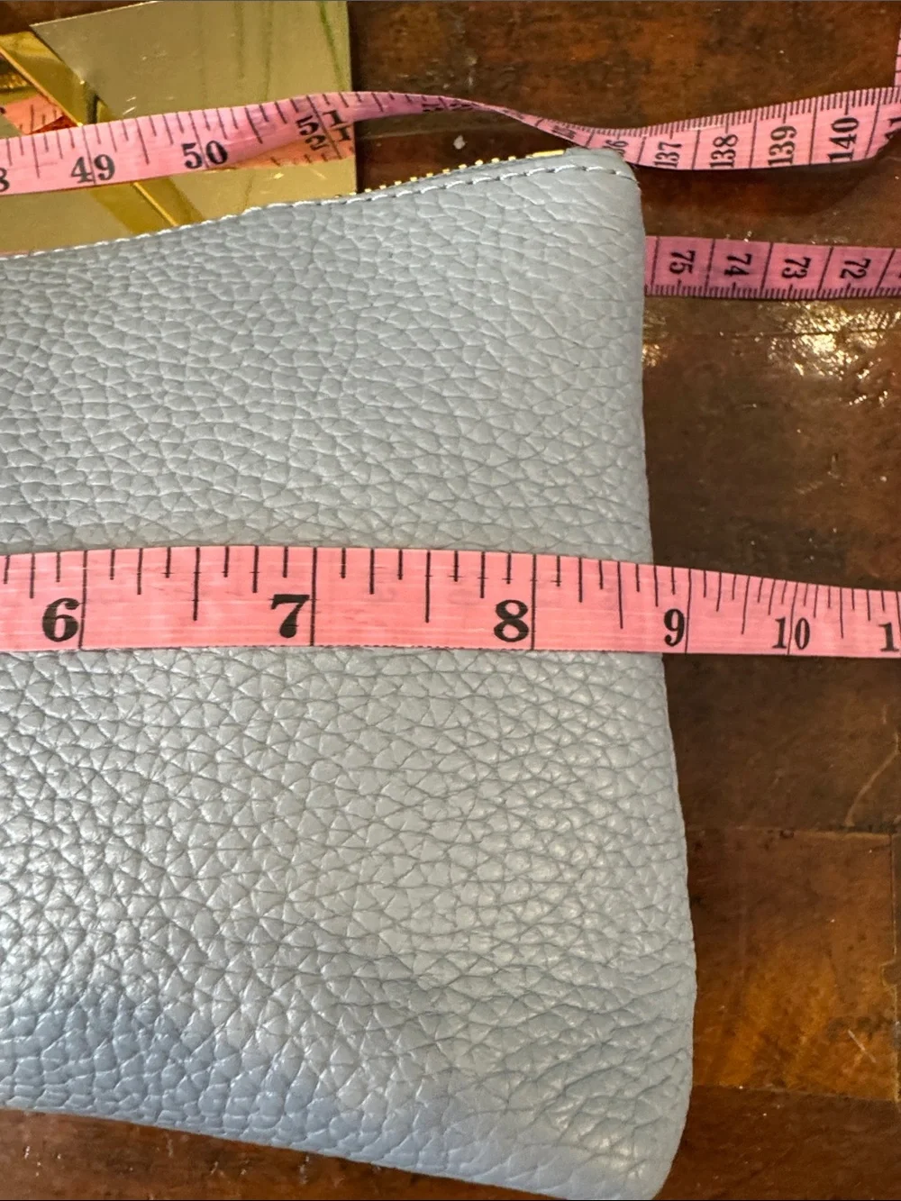 Michael Kors Light Blue Pebbled Leather Cosmetic Pouch with Gold MK Emblem